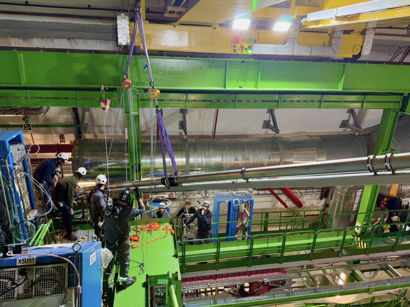 Insertion of an 11 m-long transfer line section between the experimental and service caverns of CMS. (