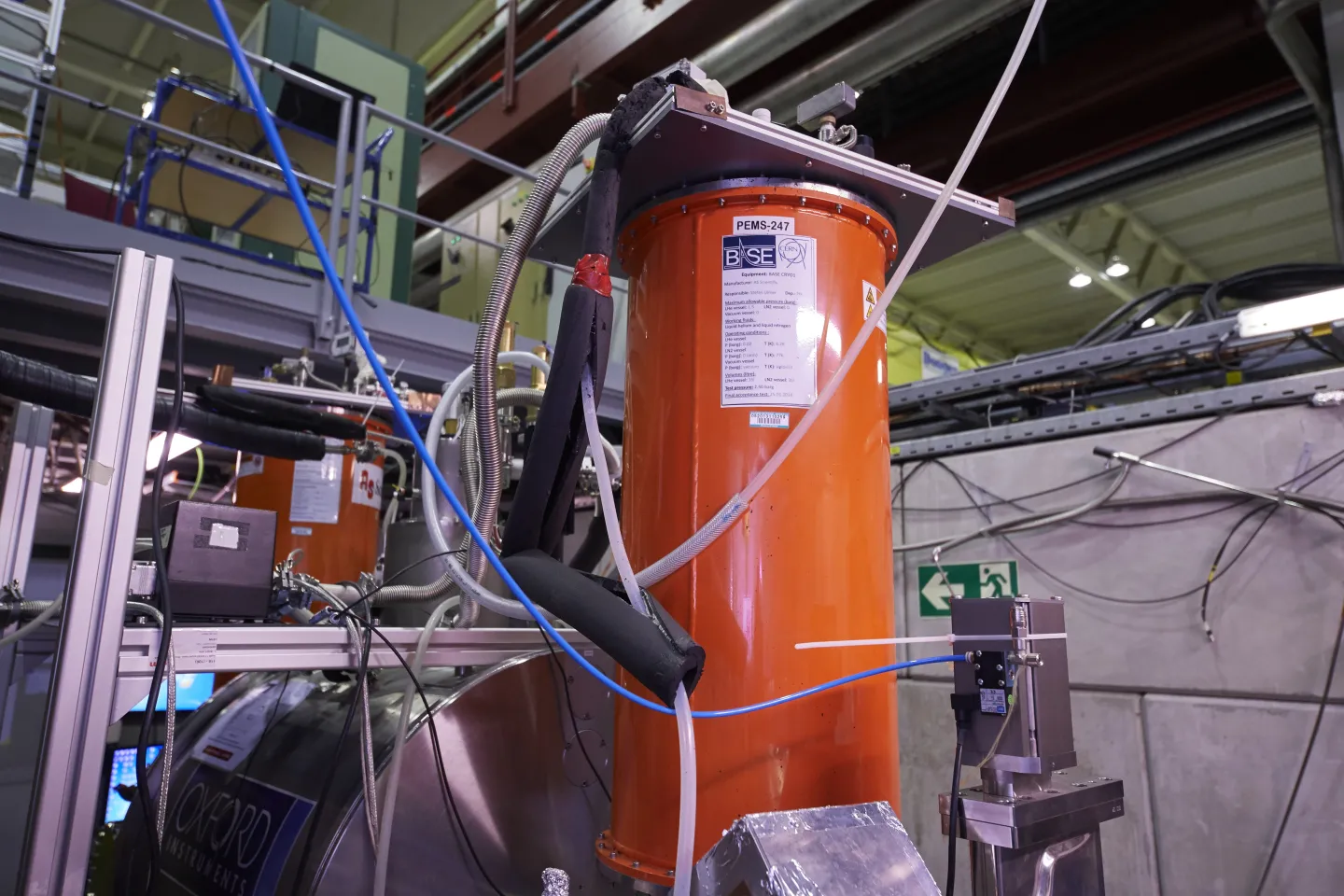 Testing CPT-symmetry and the Weak Equivalence Principle with Proton/Antiproton Clock Comparisons