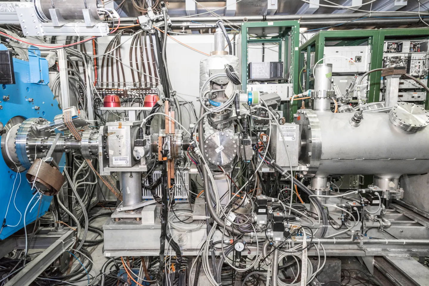 ASACUSA excites antimatter hybrid atoms immersed in superfluid helium